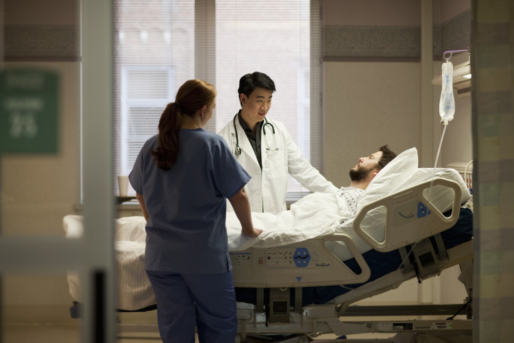 doctor-and-nurse-talking-to-patient-in-hospital.jpg