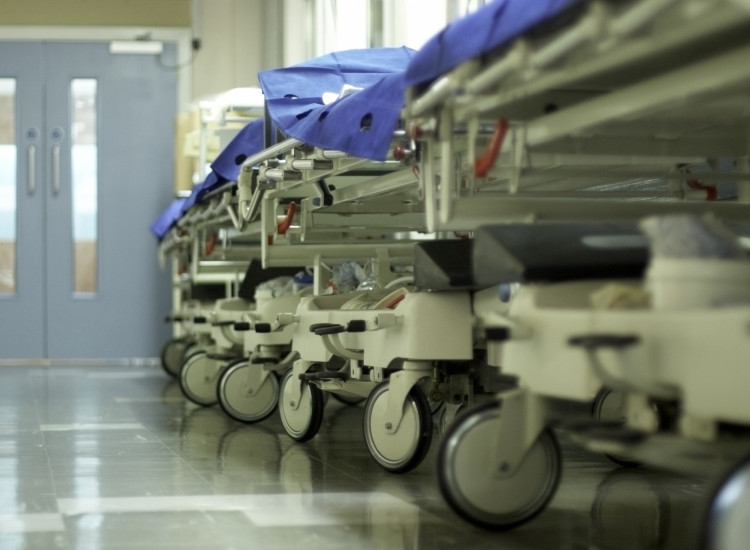 hospital-corridor-with-gurneys.jpg